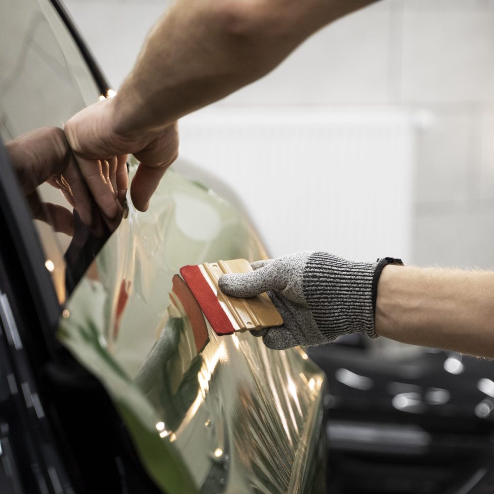 person-working-car-wrapping